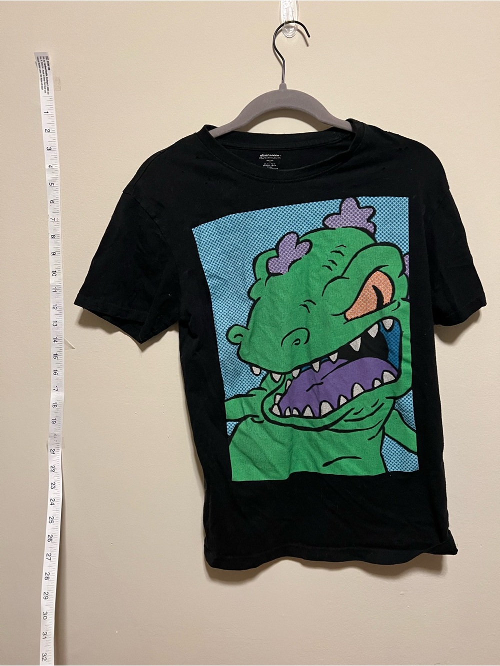 Nickelodeon Black Tee with Green Reptile Graphic